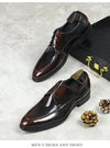 Black leather Oxfords with a luxurious finish for high-quality style.