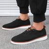 Breathable knitted walking shoes for men showing textured mesh upper and supportive design