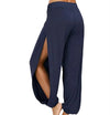 Chic high-waisted slit yoga pants for women, perfect for yoga, gym, or casual wear in breathable polyester blend fabric.