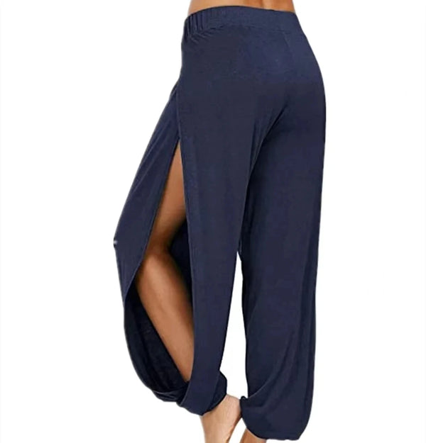 Chic high-waisted slit yoga pants for women, perfect for yoga, gym, or casual wear in breathable polyester blend fabric.