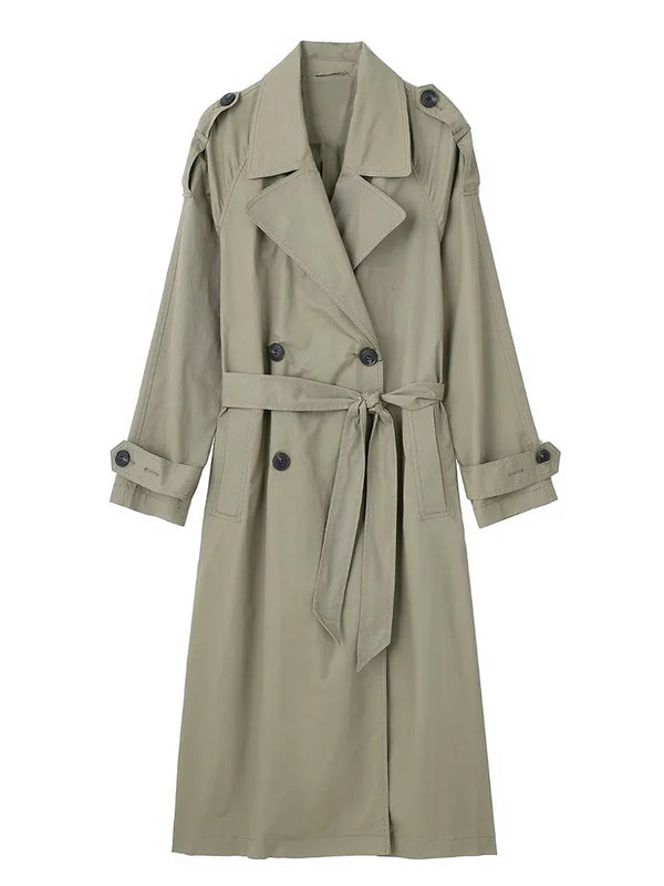 Side view of belted double-breasted trench showing flattering tailored fit