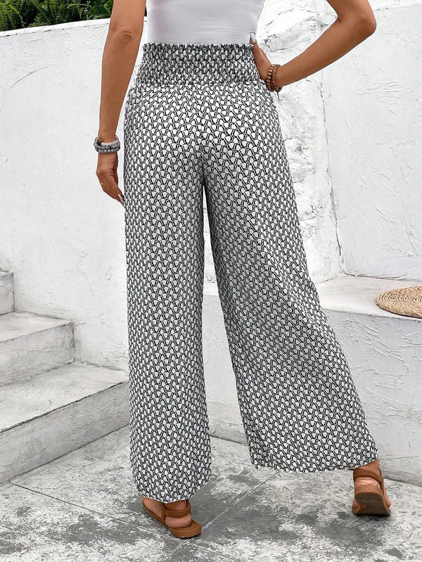 Floral wide-leg chiffon pants for women, ankle-length, elastic waist, perfect for summer fashion and casual chic outfits.
