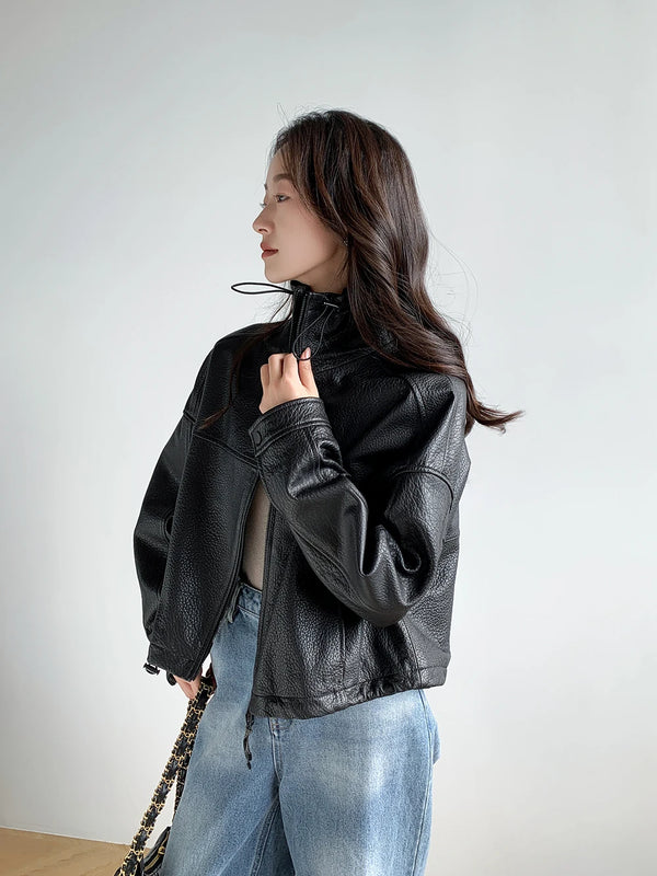 Detail of the comfortable polyester lining inside the vintage leather jacket.