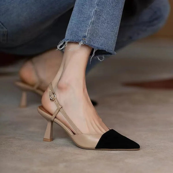 Chic pointed toe stiletto sandals in black with lace-up detail for a secure fit.