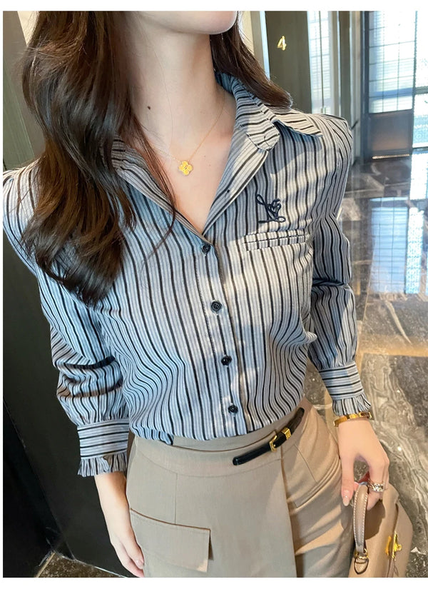 Chic striped blouse for office elegance, featuring a turn-down collar and single-breasted button front, perfect for professio