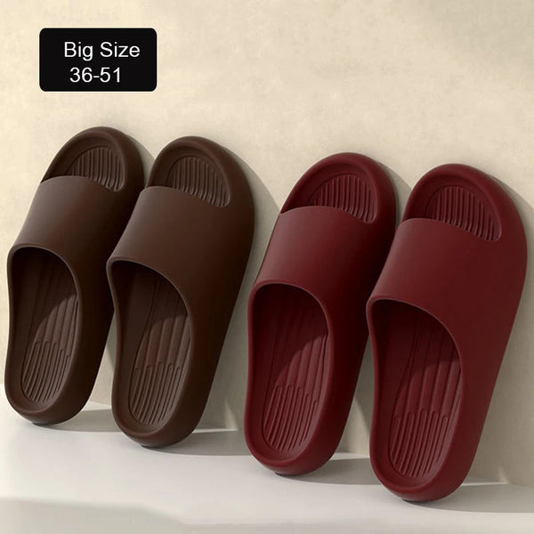 Quick-dry EVA foam slides in extended sizes up to 51 shown in neutral color on white background