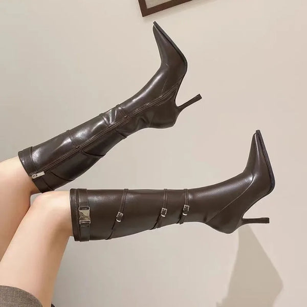 Stylish waterproof stiletto boots featuring a metal buckle detail.