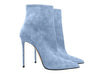 Stylish designer boots with a side zipper closure.