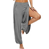 Chic high-waisted slit yoga pants for women, perfect for yoga, gym, or casual wear in breathable, stretchy fabric.