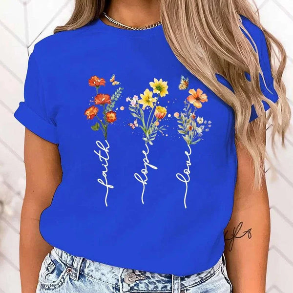 Floral print women's tee featuring 'Faith Hope Love' message, perfect for casual wear and versatile styling options.