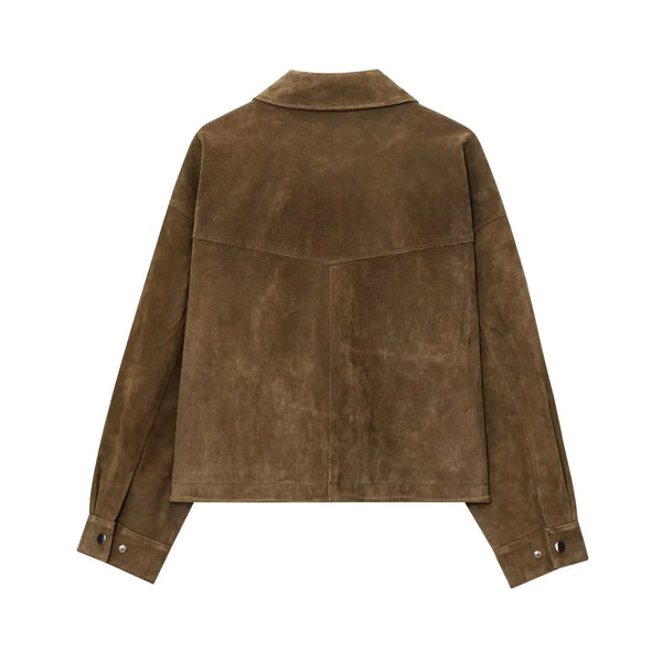 Chic women's leather jacket with button closure, lapel collar, short length, perfect for autumn fashion and urban style.
