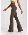 Side view of flexible high-waist wide-leg yoga pants showcasing their flowy design.