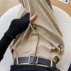 Side view of high waisted corduroy pants showing flattering wide leg cut and elongating effect