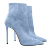 Pointed toe mid-calf boots with a striking design.