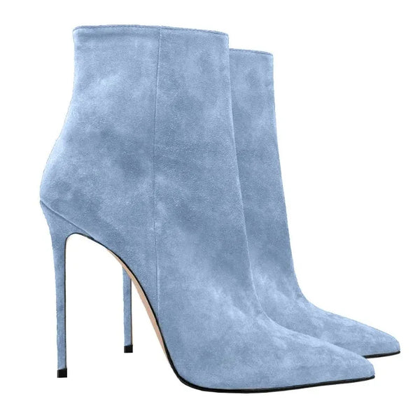 Pointed toe mid-calf boots with a striking design.