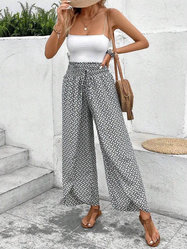 Floral wide-leg chiffon pants for women, ankle-length, elastic waist, perfect for summer fashion and casual chic outfits.