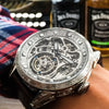 Close-up of the Timepiece of Triumph with luminous skeleton dial and stainless steel case.