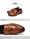 Loafers displayed on a wooden surface, showcasing their premium quality and durability.