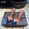 Women's clear pumps with pointed toe and breathable construction