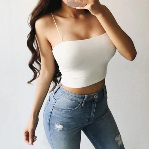 White seamless cotton crop tank top with comfortable stretch fit on neutral background