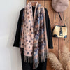 Durable polyester scarf with a luxurious look, perfect for everyday wear.