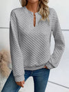 Deep V-neck hoodie perfect for pairing with jeans or leggings
