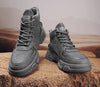 Winter Vanguard boots in a trendy café setting, perfect for city nightlife.