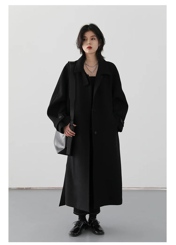 Classic belted trench coat offering warmth and refined elegance