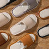 Top view of cotton-linen slippers showing roomy fit and solid pattern construction