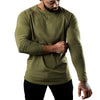 Men's long sleeve cotton tee in black, featuring moisture-wicking technology for comfort and breathability in casual wear.