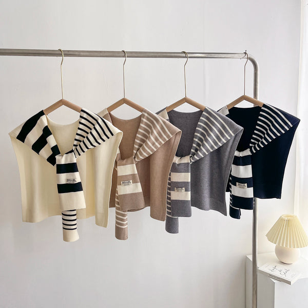 Elegant scarf featuring preppy stripes, versatile for casual and formal outfits.