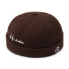 Docker cap lifestyle shot showing versatile casual styling options