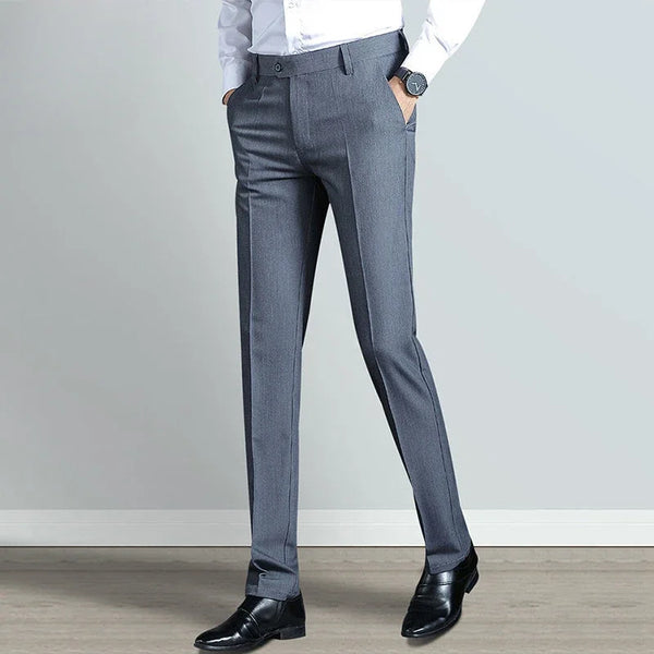 Elegant slim fit men's suit trousers in black, perfect for business attire and formal events, crafted from cotton-polyester b
