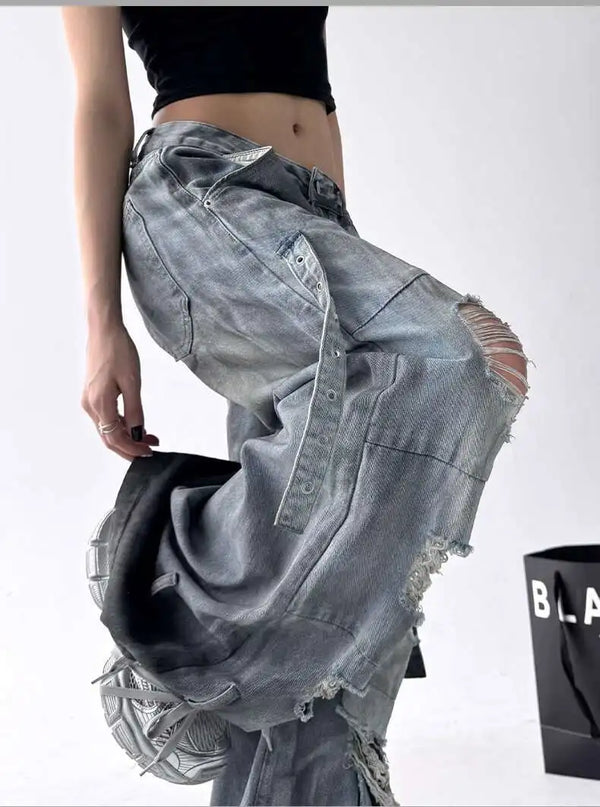 Trendy high-waist wide-leg ripped jeans for women with tie-dye and distressed detailing, perfect for casual street style.