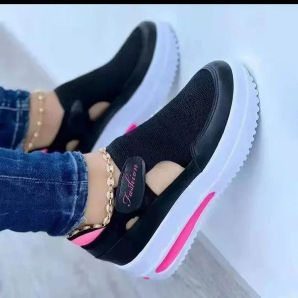 White breathable mesh sneakers showing platform sole and lace-up design for women