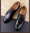 Men's black Oxford shoes with waterproof features for year-round professional wear