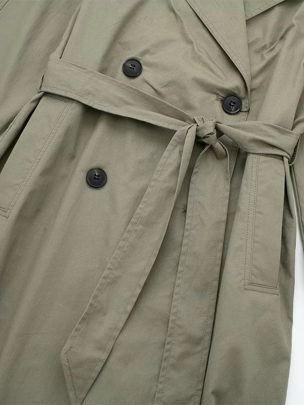 Premium polyester trench coat detail showing wrinkle-resistant fabric quality
