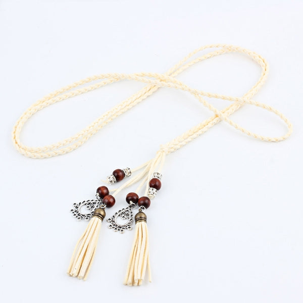 Bohemian braided faux leather skinny belt for women in camel, perfect for casual and formal outfits with fringe accents.