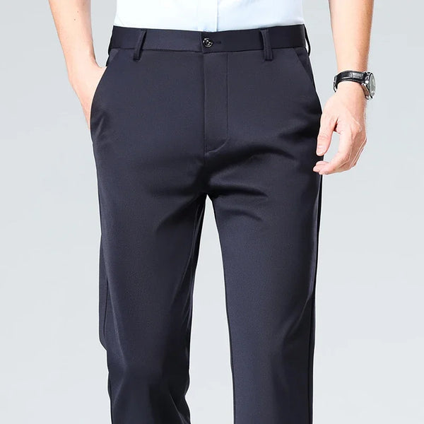 Slim-fit dress pants with flat front and zipper fly in classic black for professional wear