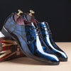 Elegant floral men's Oxford dress shoes with a sleek pointed toe design.