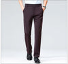 Breathable pants in charcoal gray showing elegant drape while walking