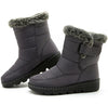 Chic women's waterproof winter boots with plush lining, perfect for cold weather and stylish outdoor adventures.