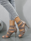 Chic blush pink stiletto heels featuring a sleek design and rubber outsole.