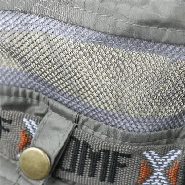 Sunlit Serenity hat displayed with hiking gear.