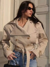 Double-breasted beige trench coat perfect for layering