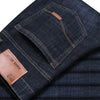 Straight cut denim jeans showcasing a sleek design for versatile occasions.