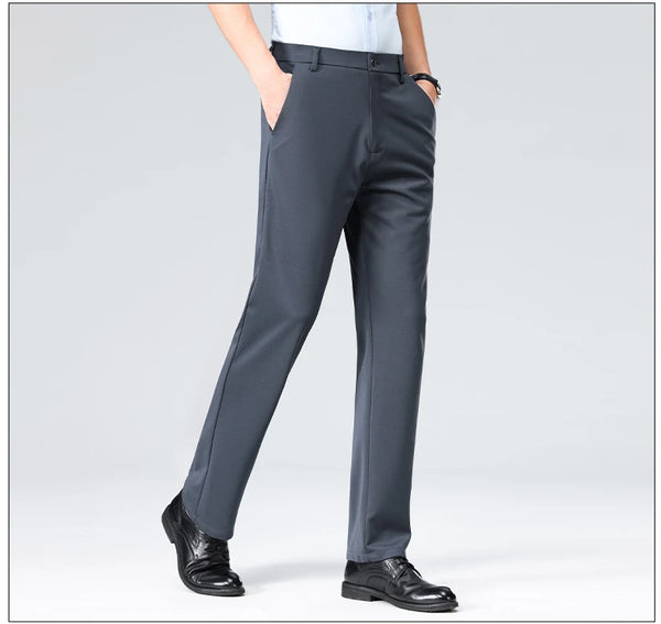 Professional in breathable polyester pants striding confidently through city business district