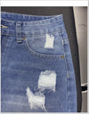 Women's distressed denim shorts with five-button fly and comfortable regular fit