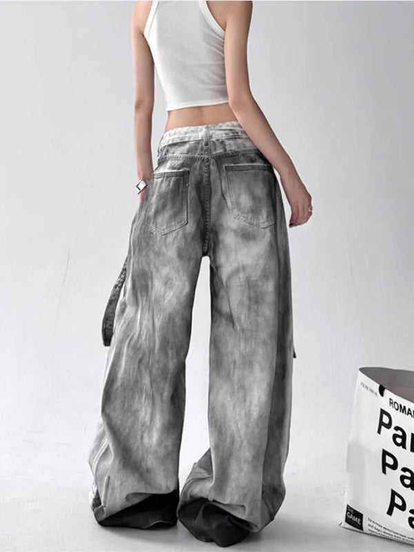 Trendy high-waist wide-leg ripped jeans for women with tie-dye and distressed detailing, perfect for casual street style.