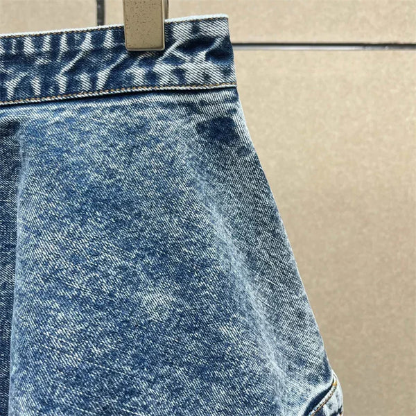 Y2K style ankle length jeans with wide leg cut and distressed cotton denim fabric